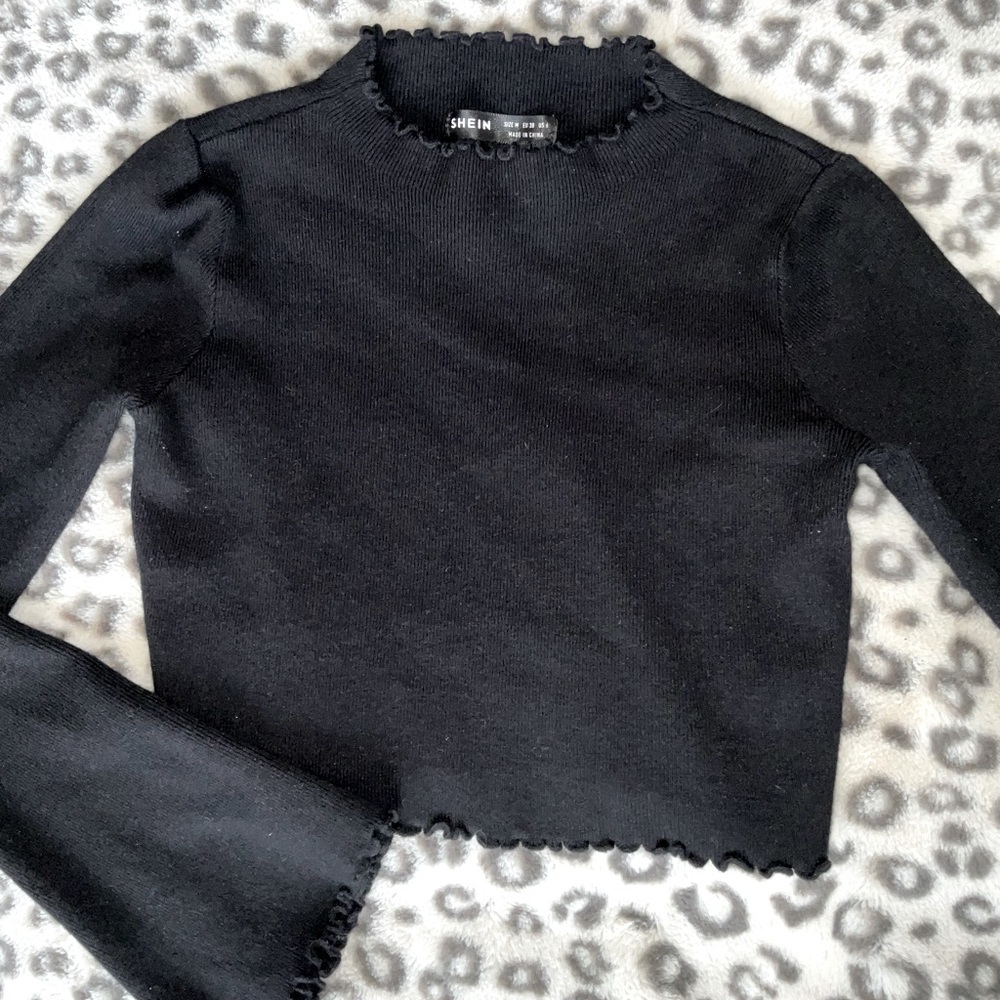 Black flared long sleeved crop-top